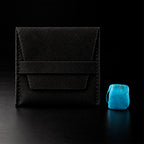 Dije Piedra Caribe dentro de pouch negro con presentación premium.