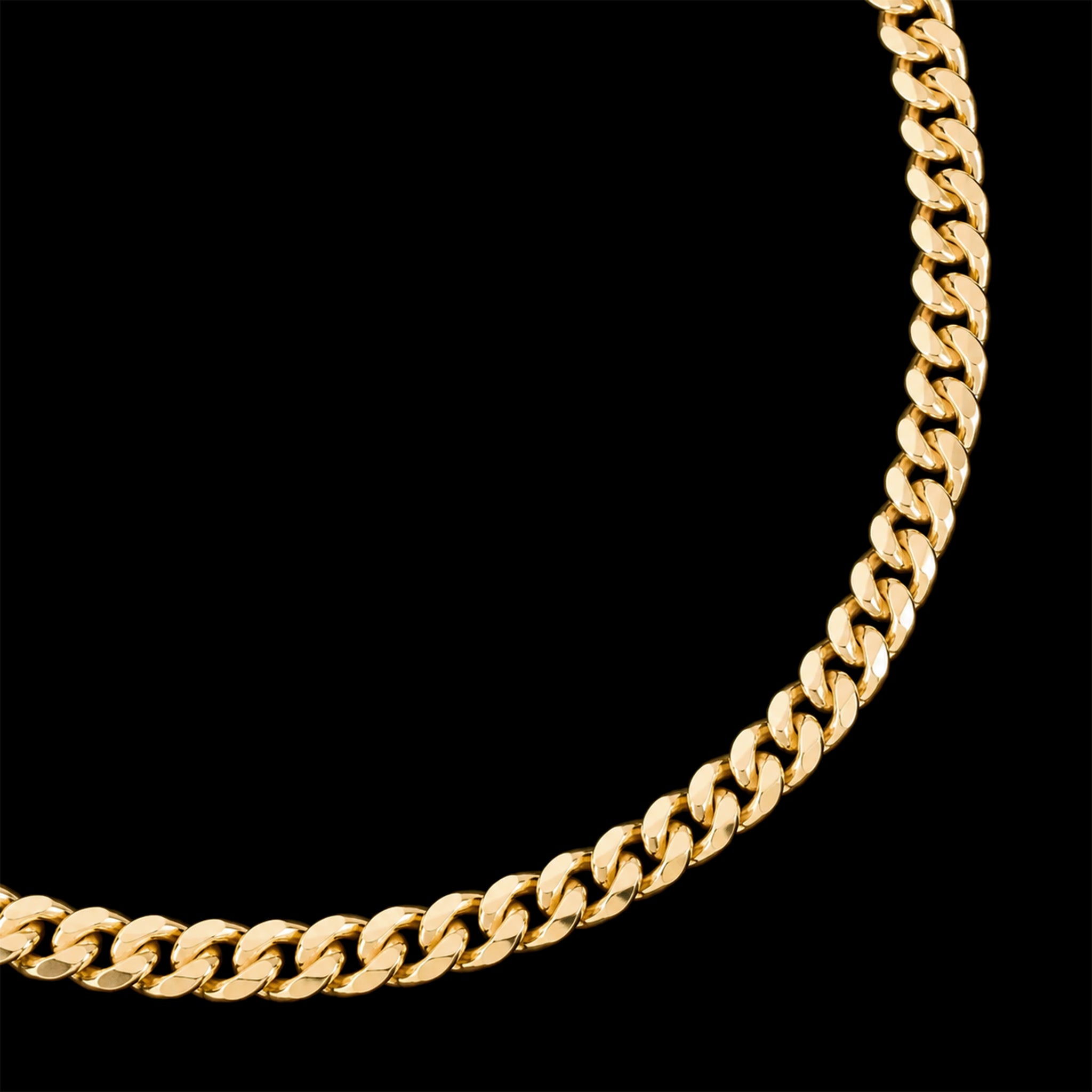Detalle de textura y eslabones Cuban Link 4mm en oro sólido 14K